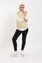 كارينا بلوزة مضلعة بفتحة رقبة على شكل V