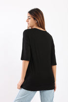 كارينا بلوزة واسعة بفتحة من الجانب كم طويل