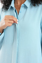 كارينا قميص سادة بأزرار أمامية كم طويل نسائي