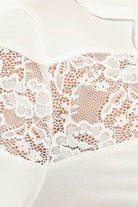 كارينا طقم بيجامة قميص بياقة مدببة بأزرار أمامية وبنطلون