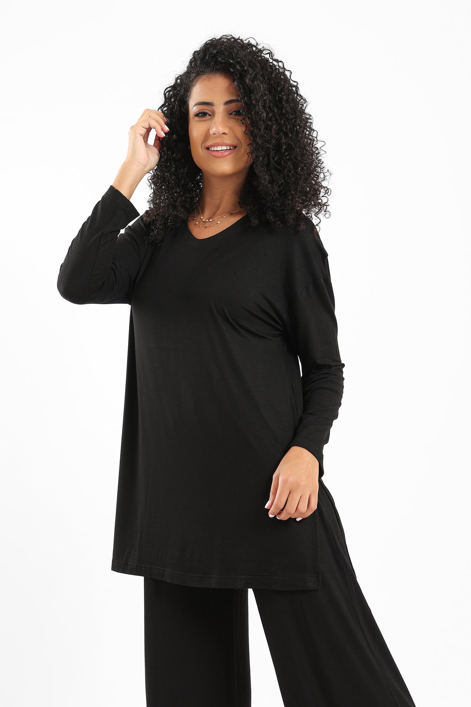 كارينا بلوزة سادة واسعة مريحة كم طويل