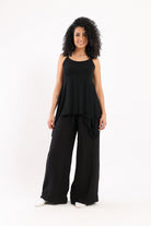 كارينا بلوزة طويلة سادة غير متساوية نسائي