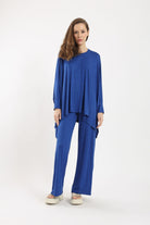 كارينا بلوزة سادة أوفر سايز غير متساوية من أسفل كم طويل