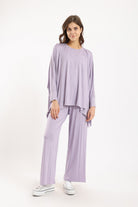 كارينا بلوزة سادة أوفر سايز غير متساوية من أسفل كم طويل