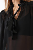 كارينا بلوزة سادة شفافة بربطة عنق كم طويل