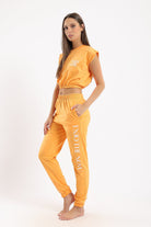 كارينا طقم بيجامة بحواف مطاطية توب وبنطلون