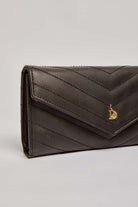 داليدرس محفظة نسائية جلد مخططة