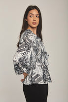 داليدرس بلوزة نسائية مزخرفة بكرانيش أسود