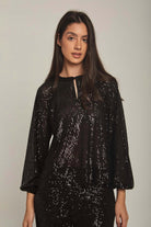 داليدرس بلوزة نسائية بترتر سهرة لميع أسود