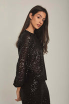 داليدرس بلوزة نسائية بترتر سهرة لميع أسود