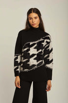 داليدرس بلوفر نسائي منسوج برقبة مرتفعة أسود