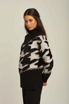 داليدرس بلوفر نسائي منسوج برقبة مرتفعة أسود