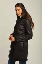 داليدرس جاكيت جلد طويل مزين بالفرو كم طويل نسائي أسود