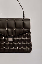 داليدرس شنطة حجلد نسائي مضلعة بكبسول أسود