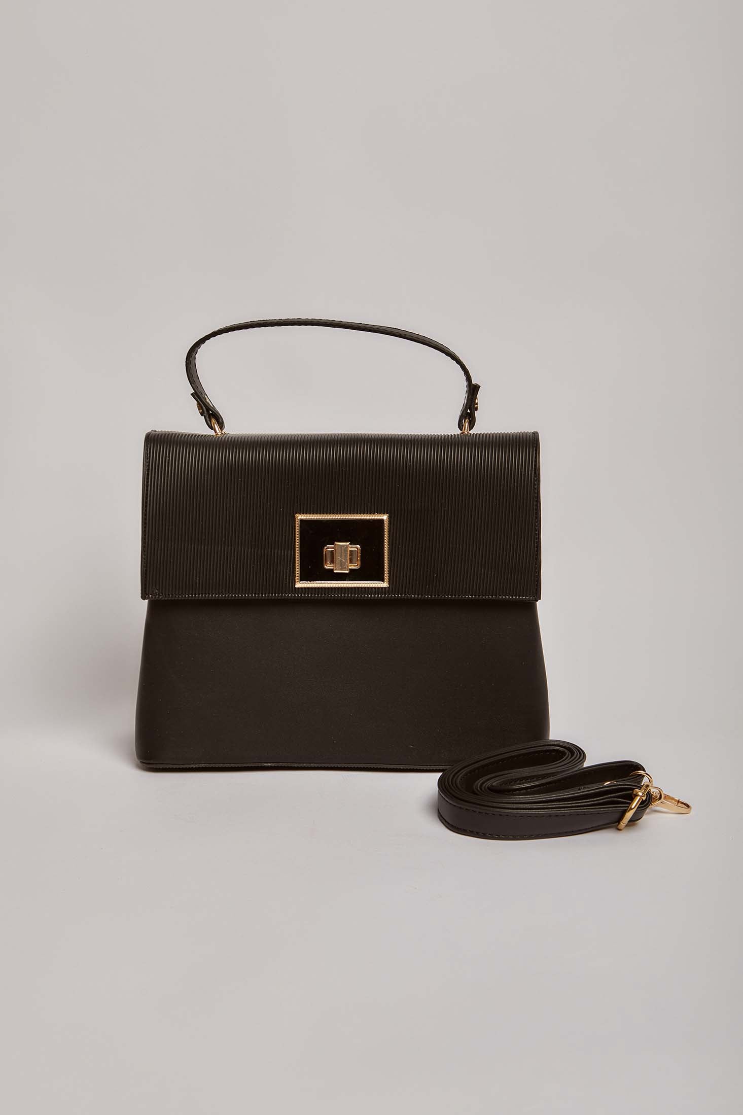 داليدرس شنطة جلد نسائي بكبسوله أسود