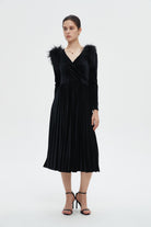 ميكا فستان نسائي بكم طويل وأزرار أمامية للركبة