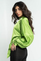 داليدرس بلوزة نسائي سادة بف بتطريز على الرقبة