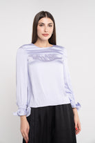 نتشي بلوزة سادة كم طويل بأساور على شكل وردة