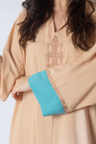 ديامانتين جلابية بأكمام طويلة مطرزة من الأمام نسائي بيج