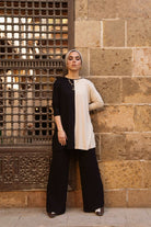 كارينا توب طويل بأزرار أمامية كم طويل نسائي أسود