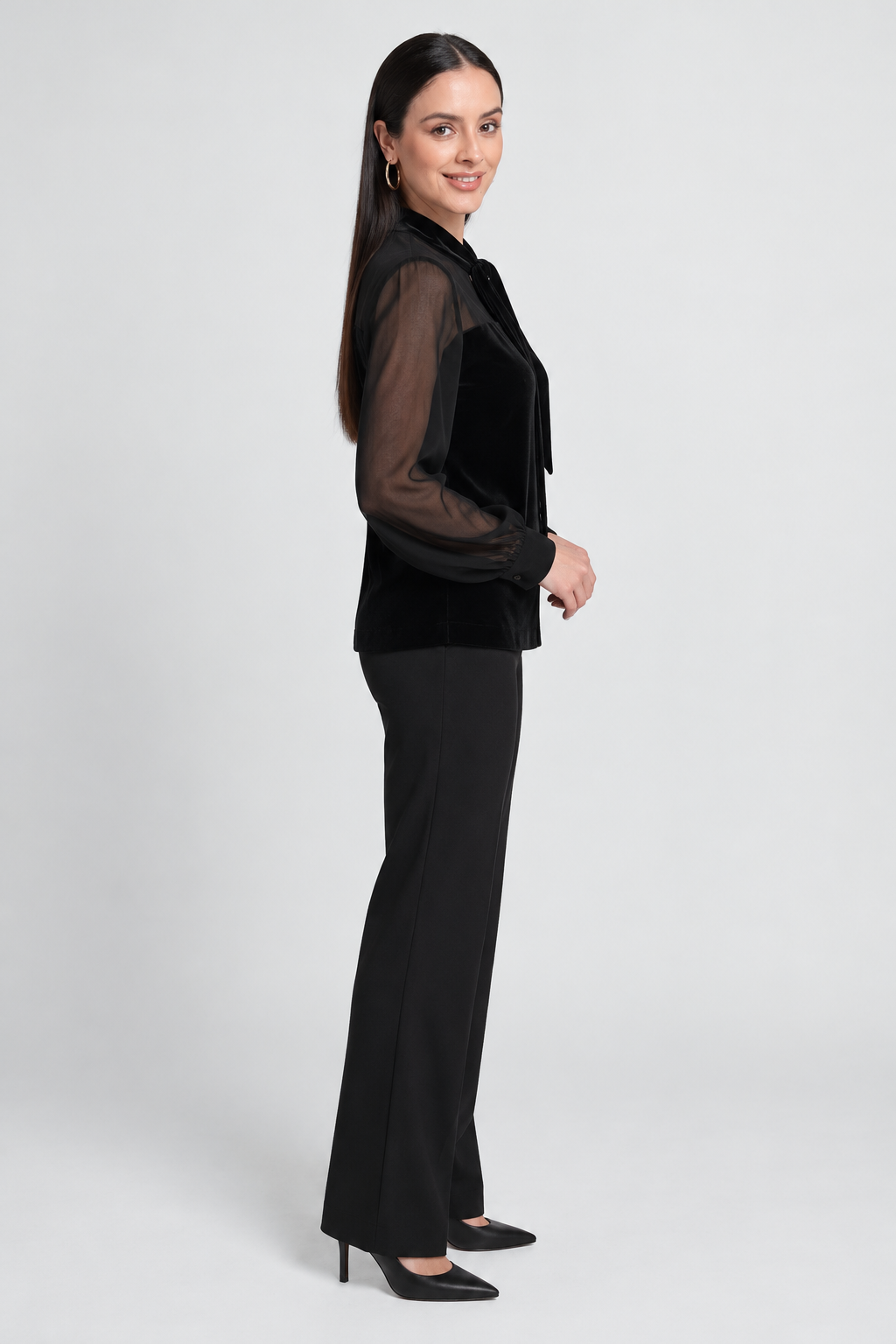 Black long-sleeve top — side view