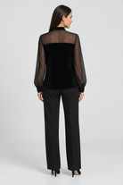 Black long-sleeve top — back view