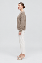 IYE815W264CDY tan long-sleeve V-neck knit sweater on Nina, side