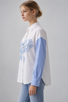 LIV0221AGI light blue embroidered shirt side on model Temmy
