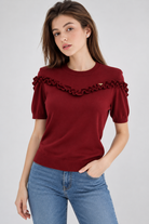 LIV0344AGI burgundy ruffle top garment detail on model Andrea