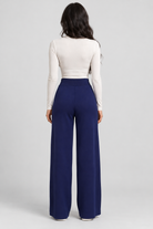 Helya, blue pants, back