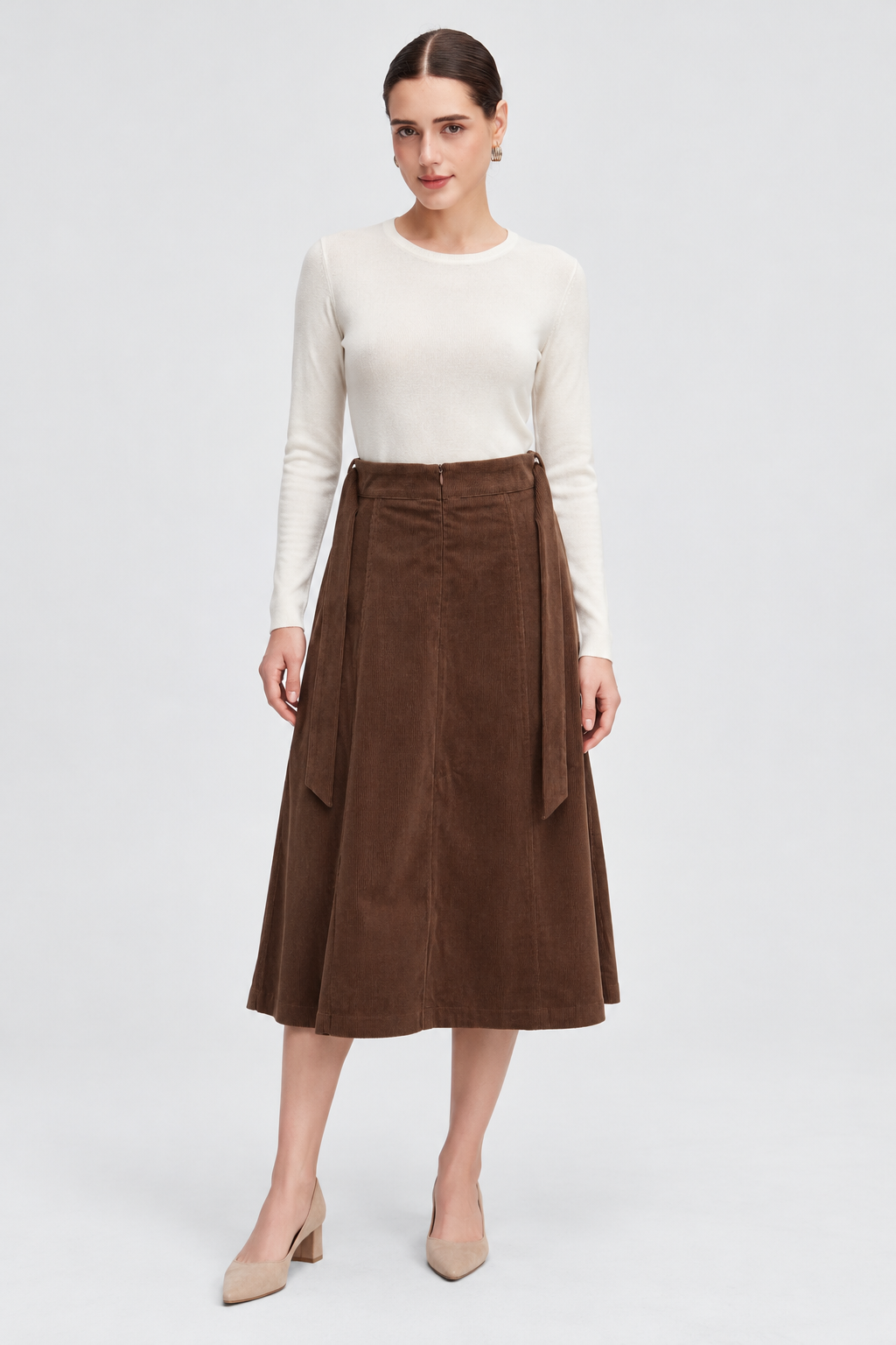 MA0873W264WN brown corduroy skirt on Hanna, full front