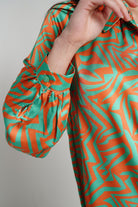 ميكا قميص بأكمام طويلة منقوش بأزرار أمامية