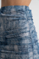 ميكا تنورة ميدي منقوشة ضيقة أزرق فاتح