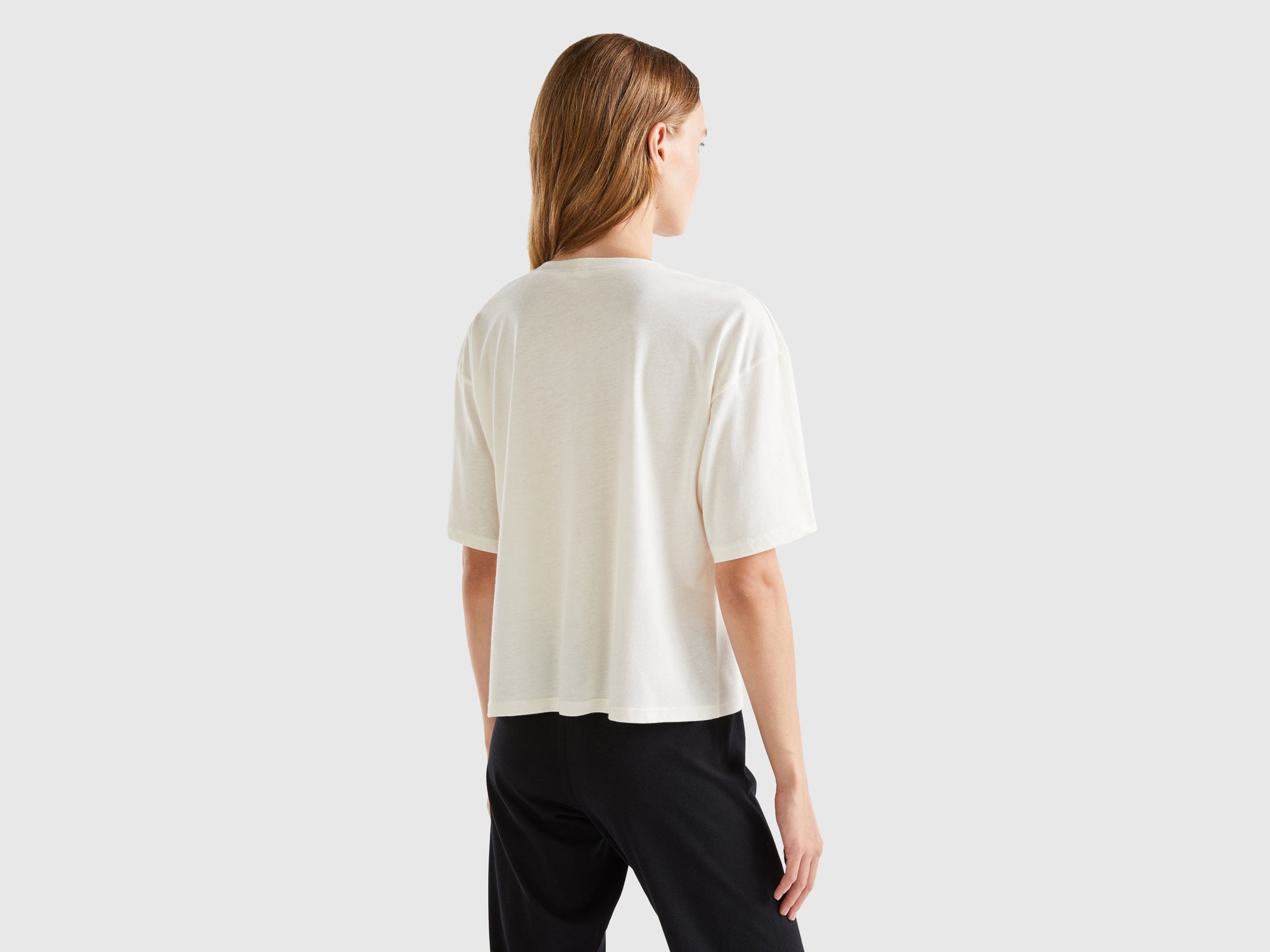 يونايتد كولورز اوف بينيتون تيشيرت واسع بنقشة زهور نص كم نسائي