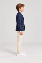 Right model view of Gingersnaps boys navy plaid blazer