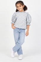 Girls' blue floral puff sleeve blouse — lifestyle