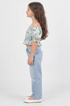 Girls' lilac tropical off-shoulder blouse — left