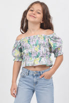 Girls' lilac tropical off-shoulder blouse — lifestyle