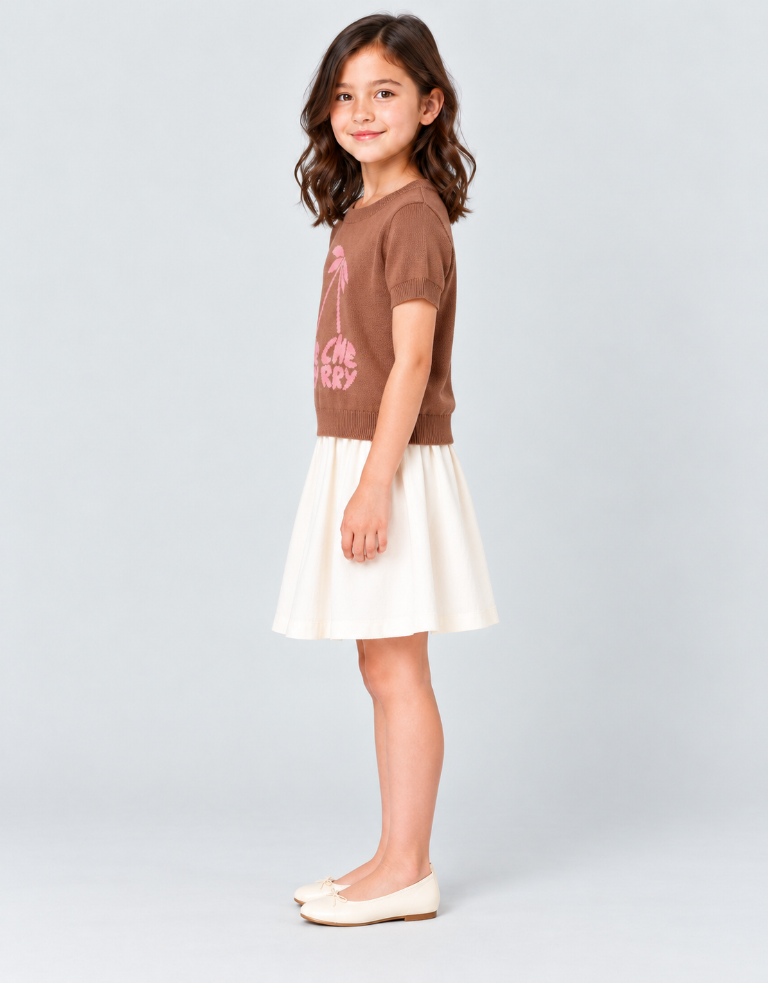 Girls brown knit cherry top, side view