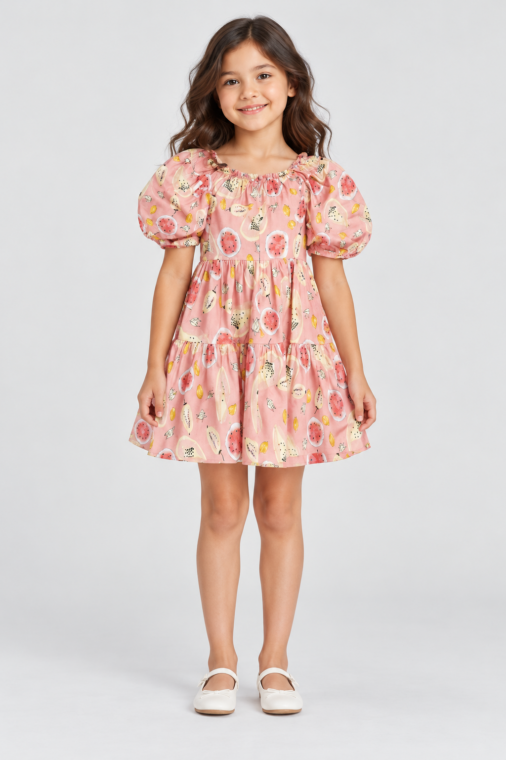 Girls’ blush-pink fruit-print tiered dress, full front on child model Lina