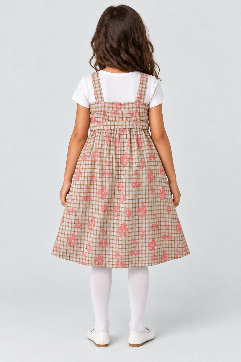 Girls plaid fruit print dress on child model, back view
