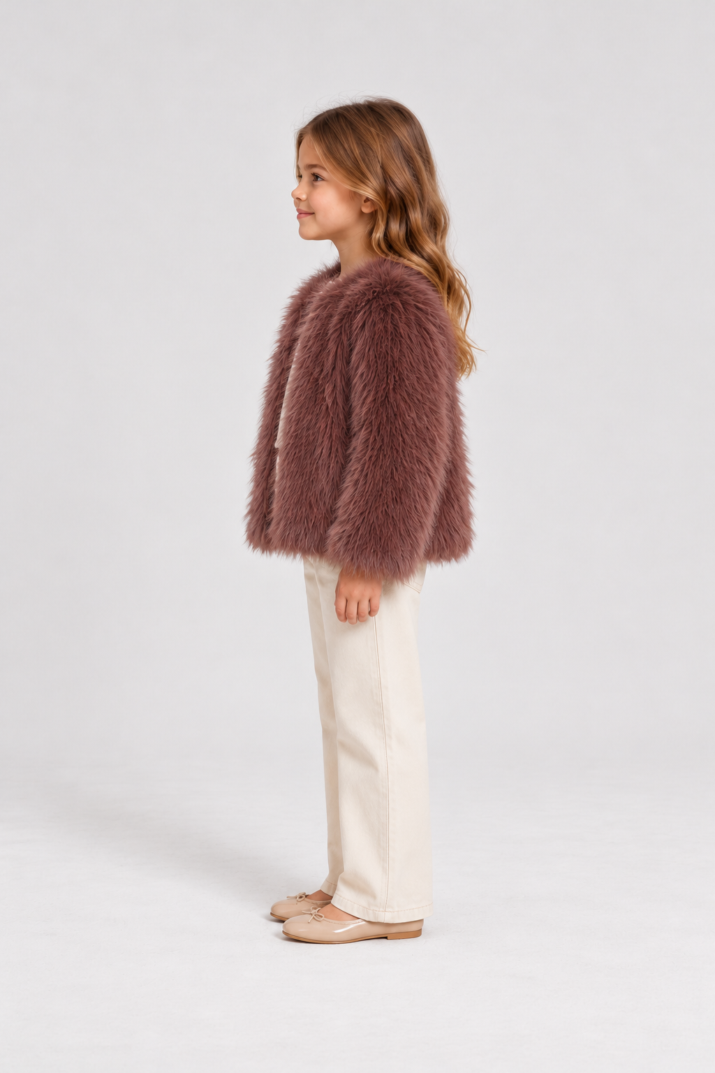 Gingersnaps dusty mauve faux fur jacket on child model, right side view