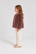 Gingersnaps dusty mauve faux fur jacket on child model, right side view