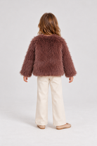 Gingersnaps dusty mauve faux fur jacket on child model, back view