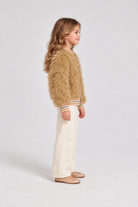 Gingersnaps fuzzy zip jacket on child model, right side view