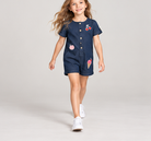 lifestyle view of girls gjs0265 romper on a girl model