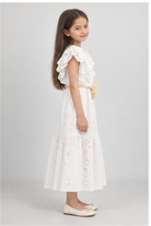 Girls' long white eyelet dress with rosette belt on child model, right side view