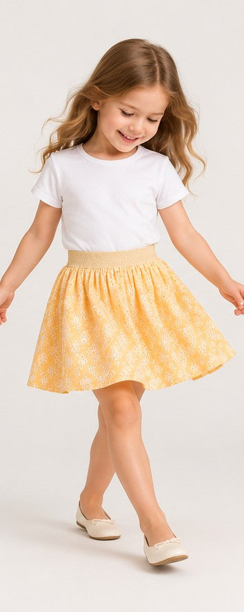 Girls model lifestyle view wearing Gingersnaps yellow embroidered skirt
