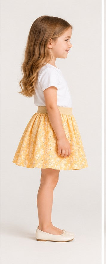 Girls model right view wearing Gingersnaps yellow embroidered skirt