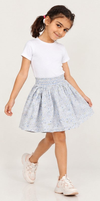 Girls model lifestyle view wearing Gingersnaps pale blue floral skirt